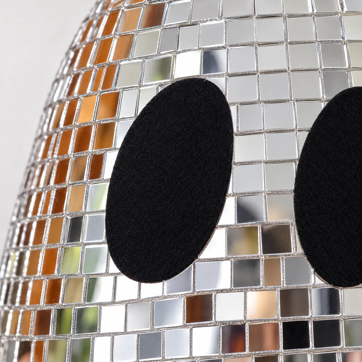 Close-up of mirrored disco ghost decor for autumn and seasonal home styling