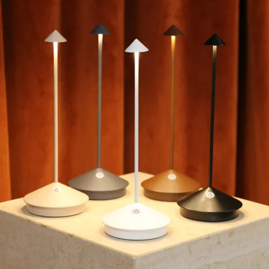 Sleek silhouette of the wireless LED table lamp against a neutral wall