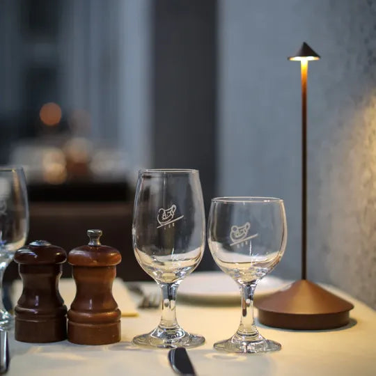 Elegant wireless LED table lamp accentuating a modern minimalist hallway