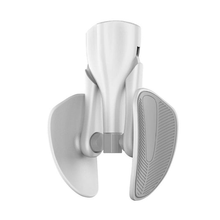 Men's wellness exercise device and pelvic floor trainer fitness equipment laid flat on surface