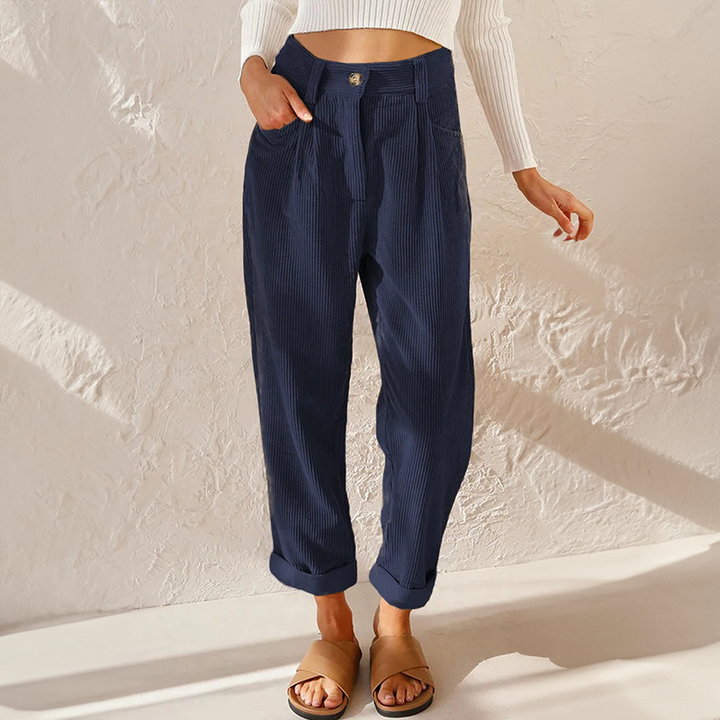 Back view of women's relaxed fit corduroy pants with tailored pocket detailing