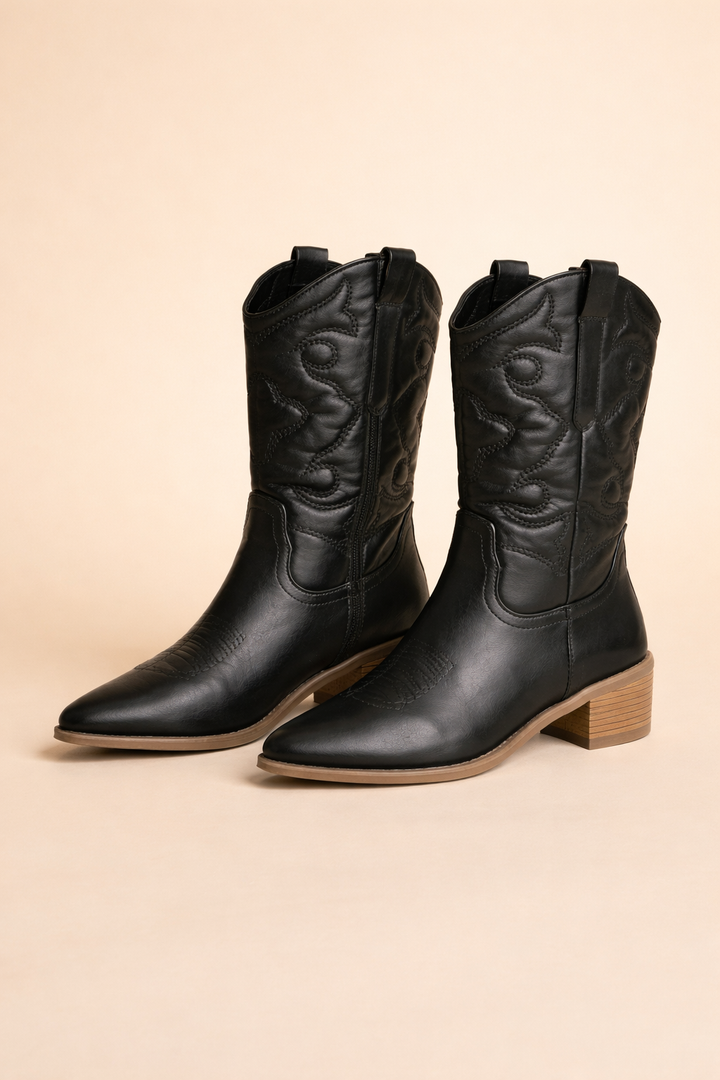 Side profile of womens fashion cowboy boots showing convenient inner side zipper.
