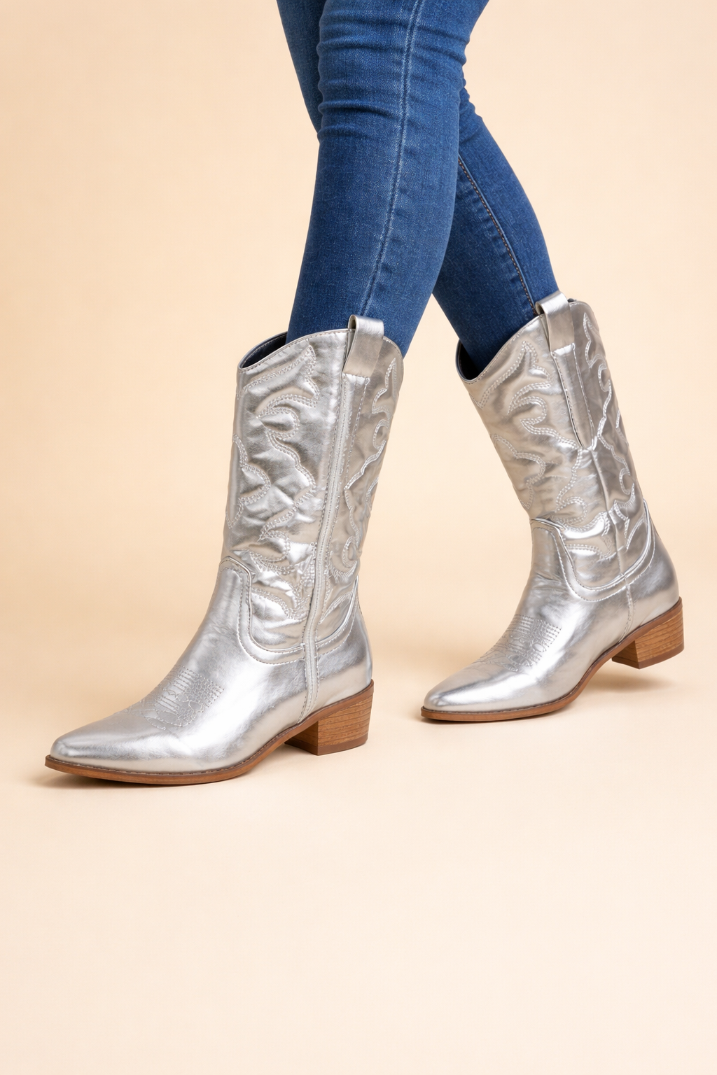 Womens retro western cowboy ankle boots featuring detailed embroidery and a side zipper.