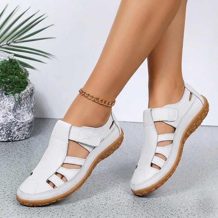 A woman wearing white non-slip summer sandals