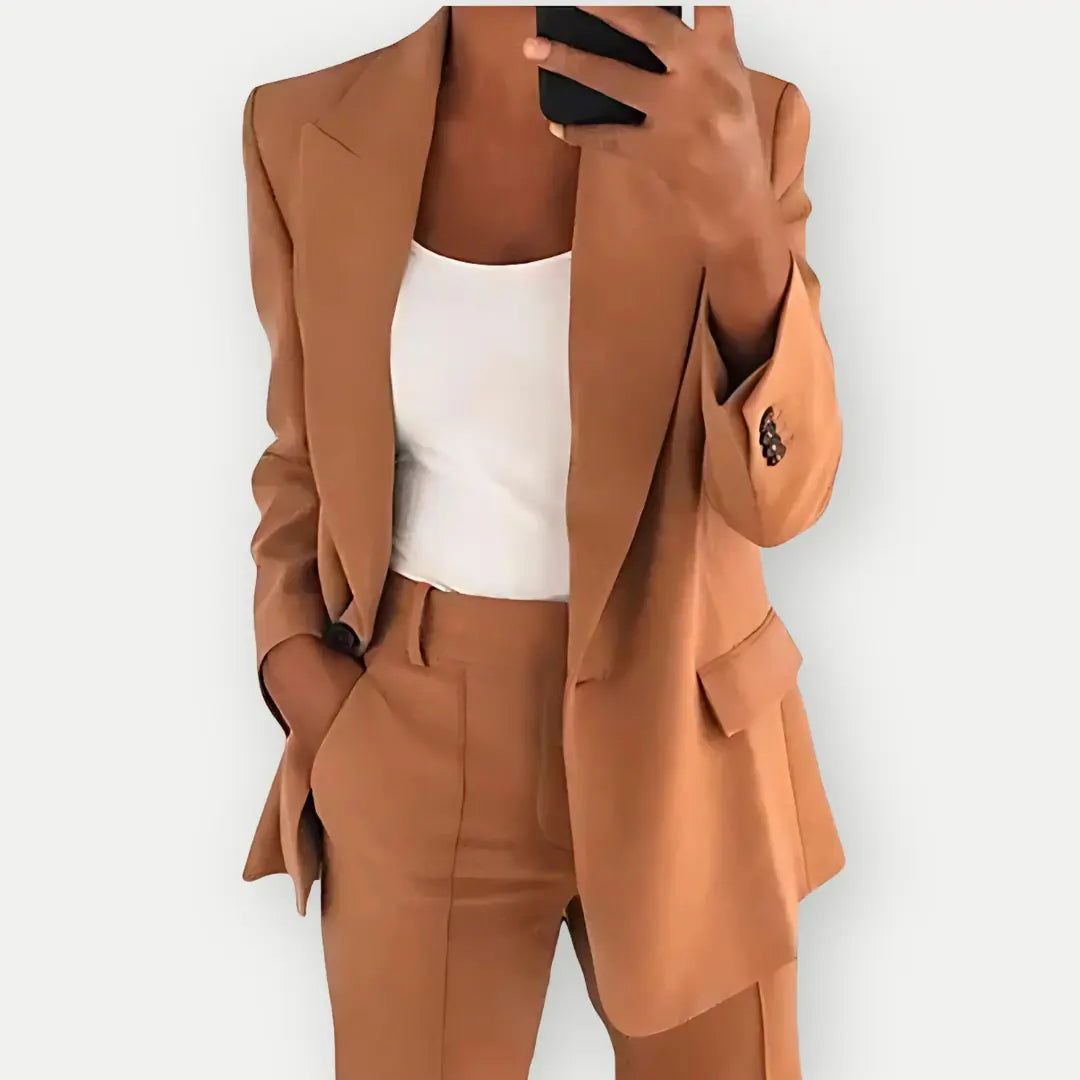 Elegant women workwear outfit with a fitted blazer and matching pants