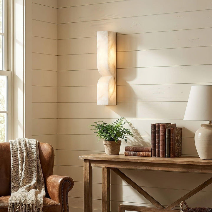 Elegant indoor wall sconce featuring genuine alabaster and energy-efficient LED bulbs