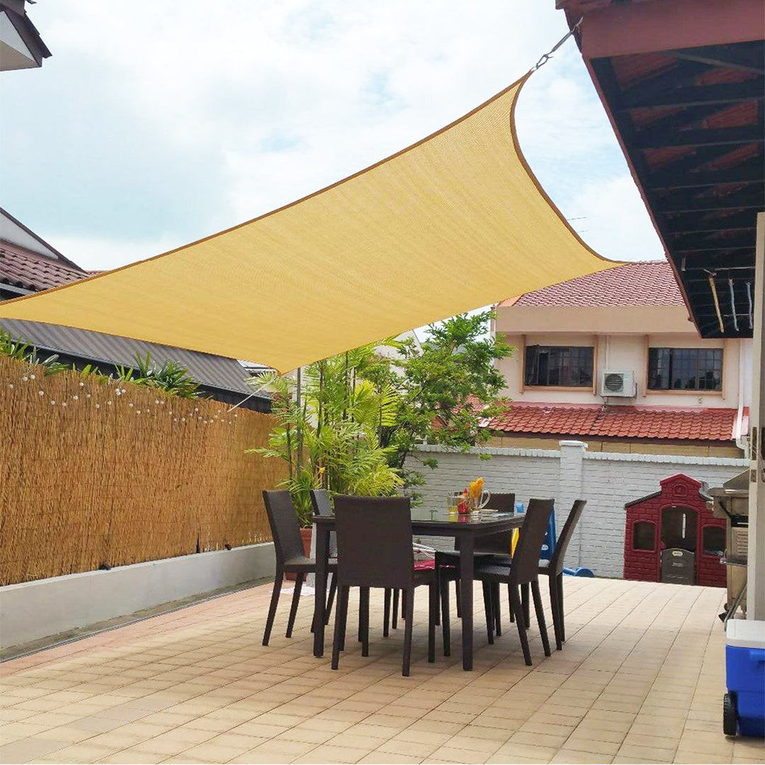 Garden accessories setup featuring a protective UV shade sail mounted outdoors