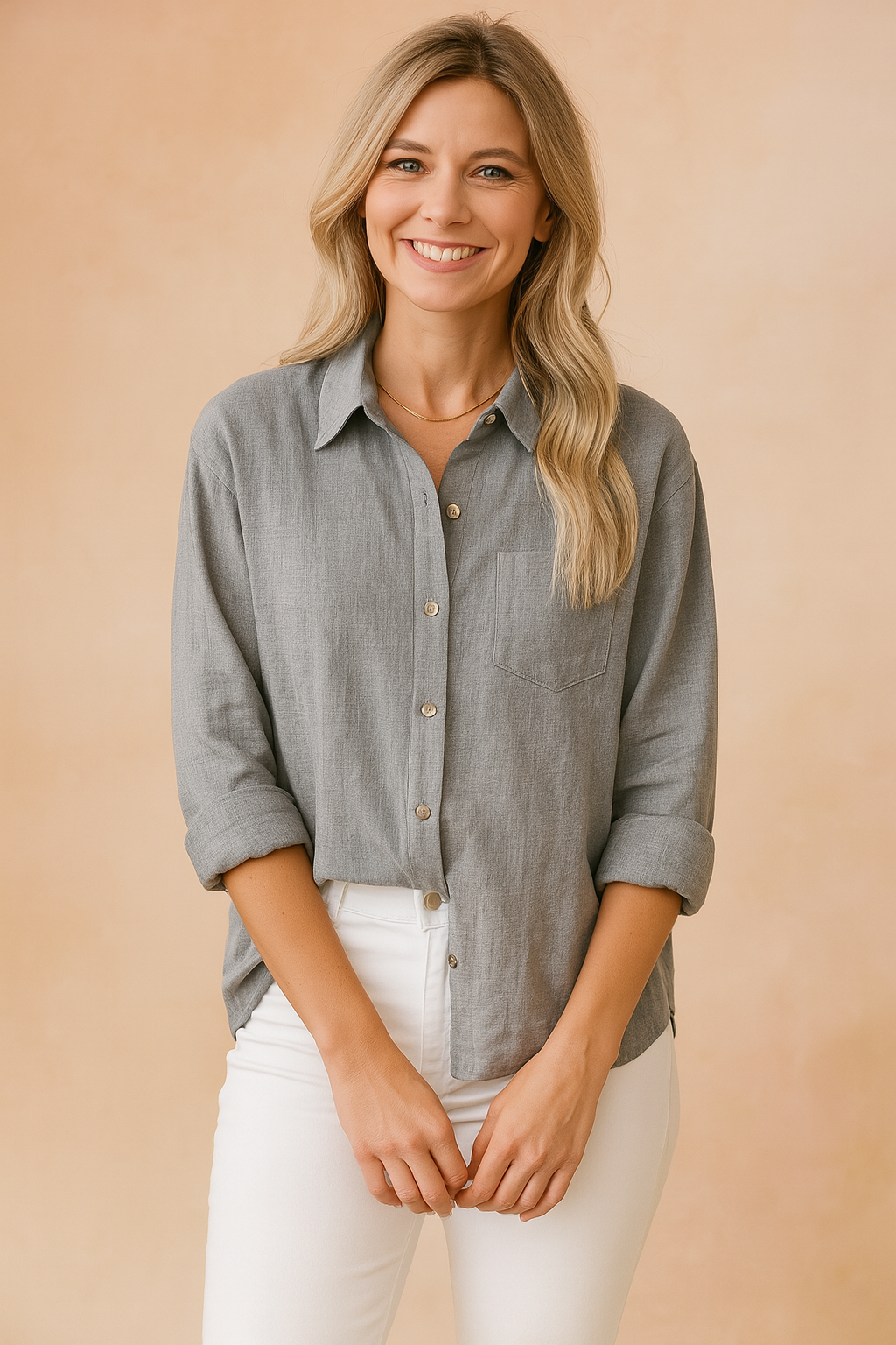 Close-up of a model wearing a gray casual button blouse