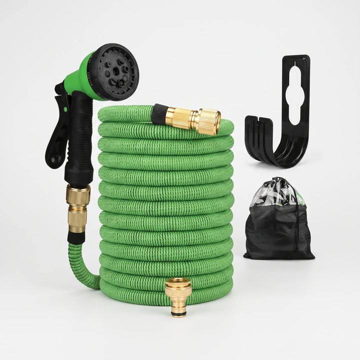 Flexible expandable garden hose connected to a multi-pattern spray nozzle for easy lawn care and watering.
