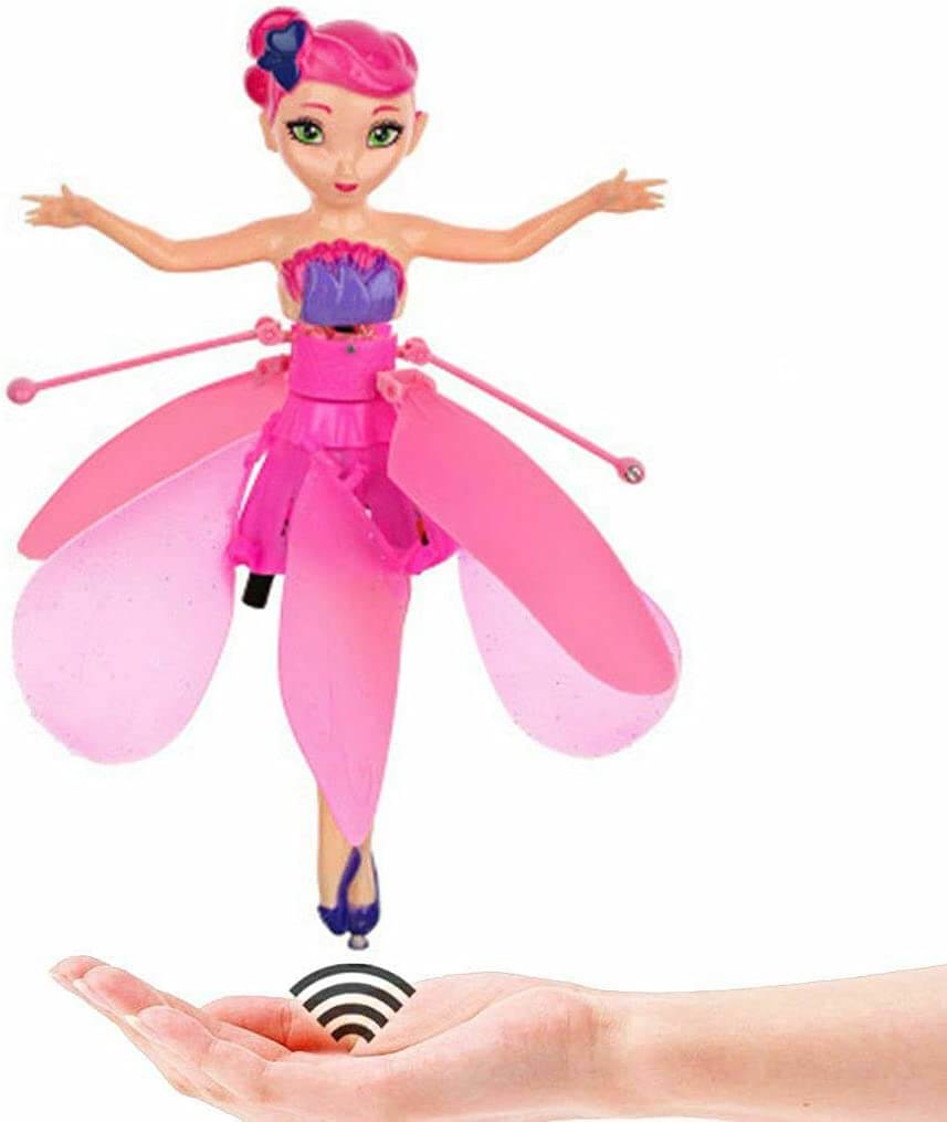Pink flying fairy doll demonstrating wireless sensor control over an open palm