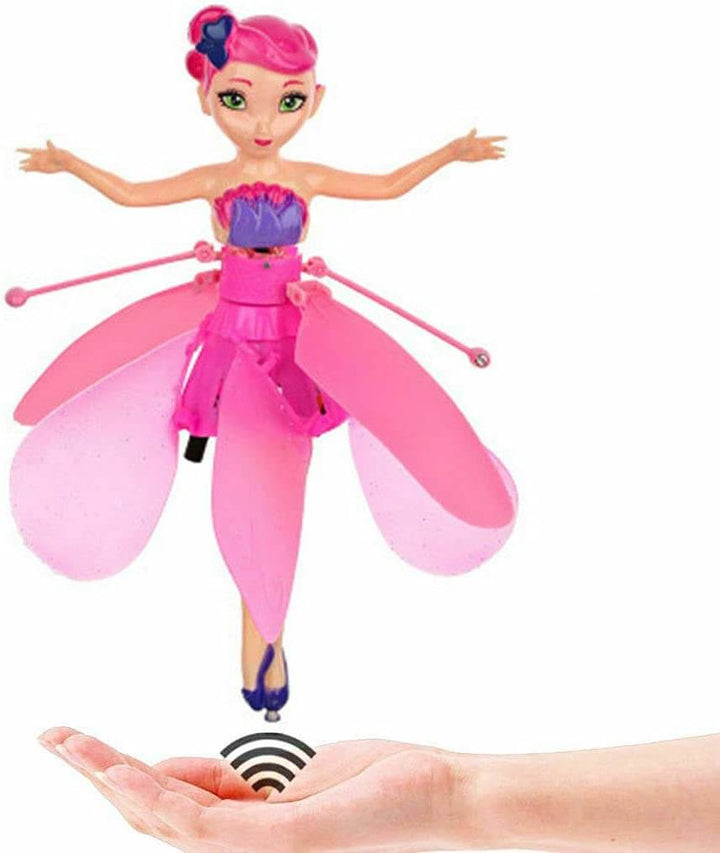 Pink flying fairy doll demonstrating wireless sensor control over an open palm