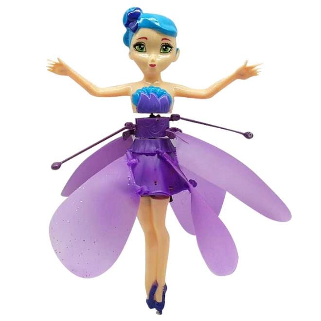 Sensor controlled flying fairy toy hovering above a child's hand