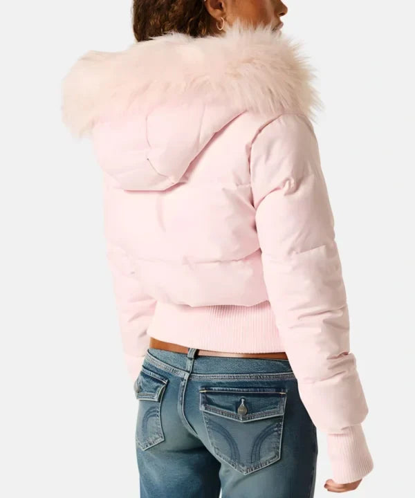 Model wearing the slim fit quilted winter jacket with faux fur hood