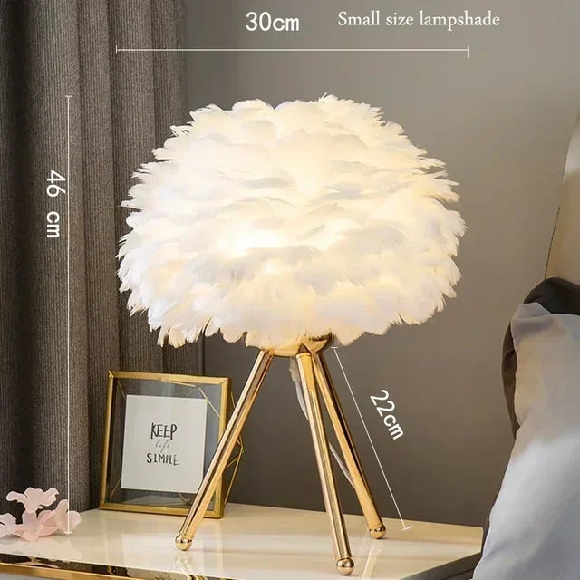 Decorative feather table lamp casting soft ambient light for home decor
