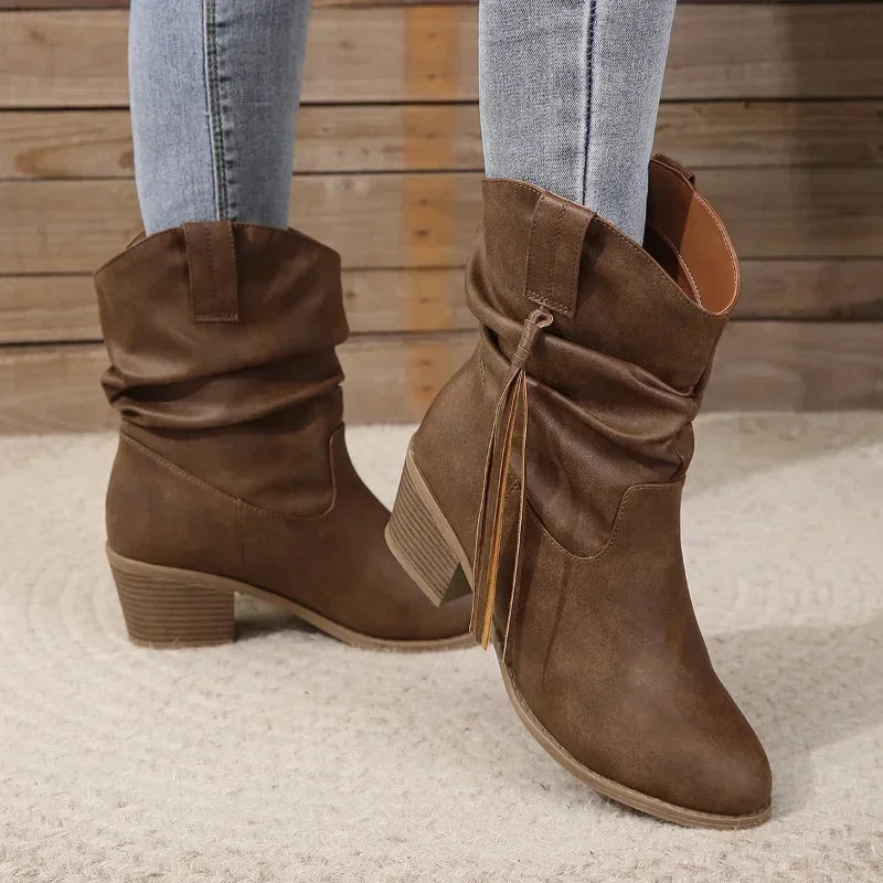 Womens brown western cowboy boots featuring chic braided tassel detail