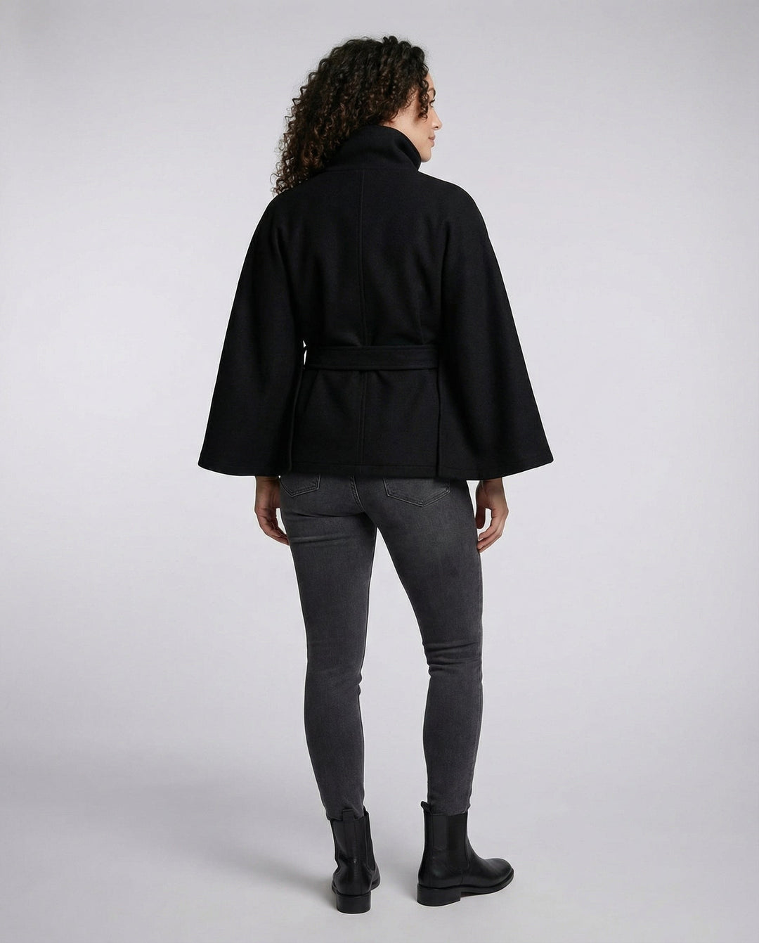 Women's high-collar belted wrap jacket in winter coat style, front view