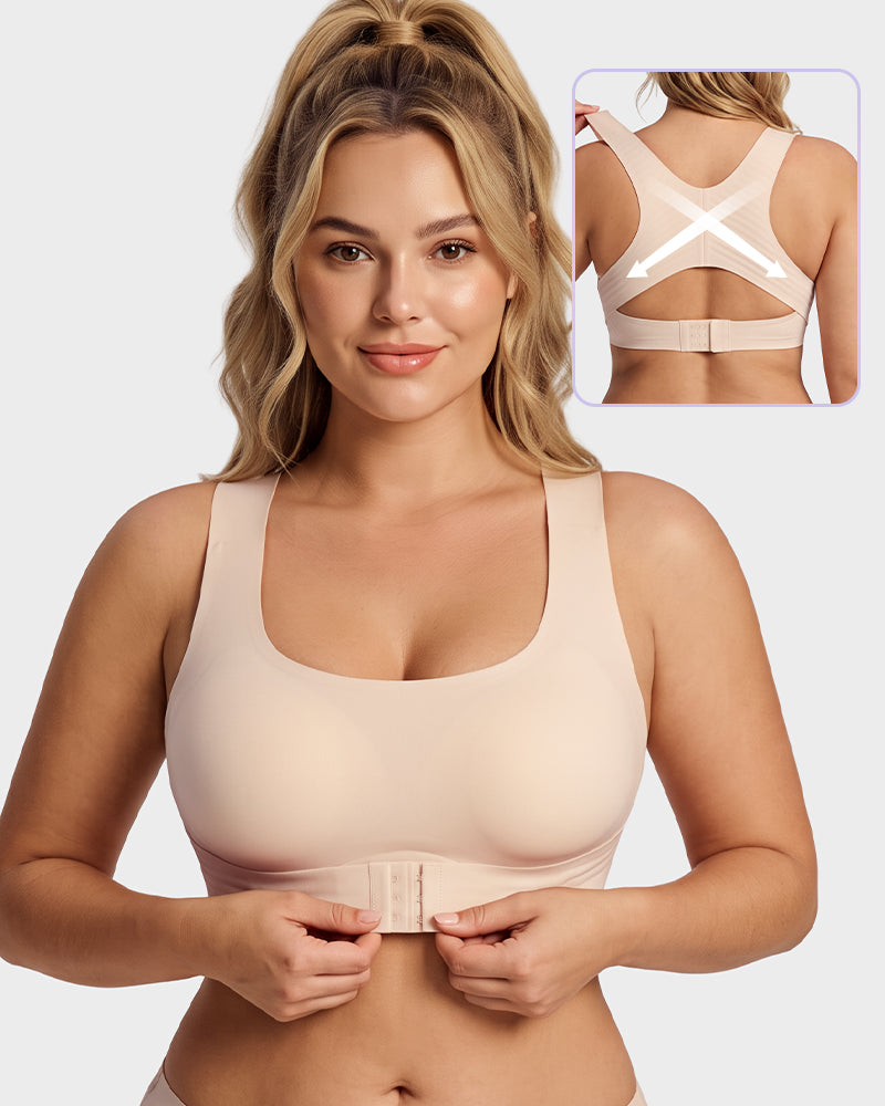 Woman wearing beige front closure cross-back wireless posture bra, front view