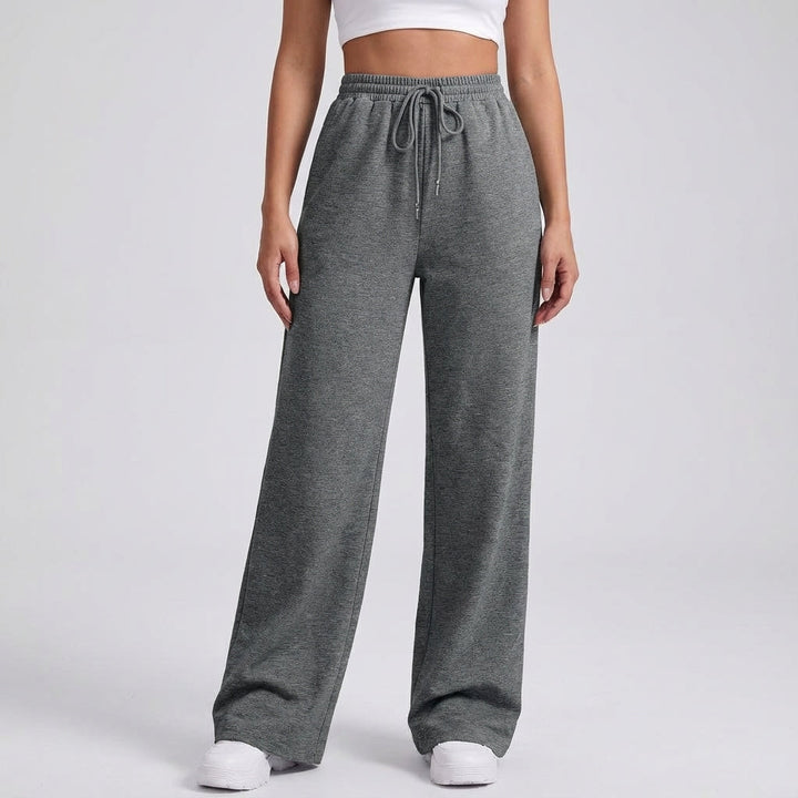 Close-up of warm sweatpants fabric texture on wide-leg trousers for women