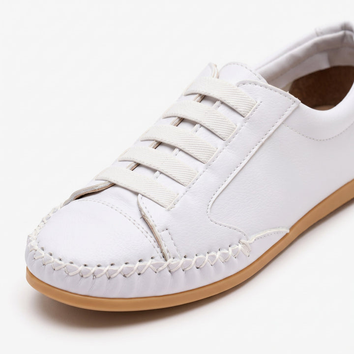 Side profile of women's comfortable slip-on loafer sneaker in casual style
