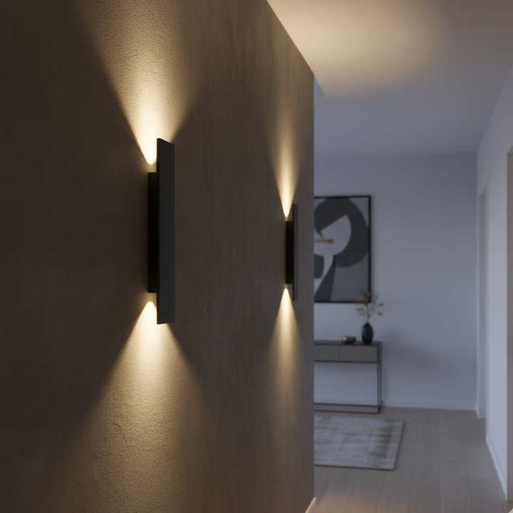 Indoor hallway wall lighting casting soft upward and downward beams
