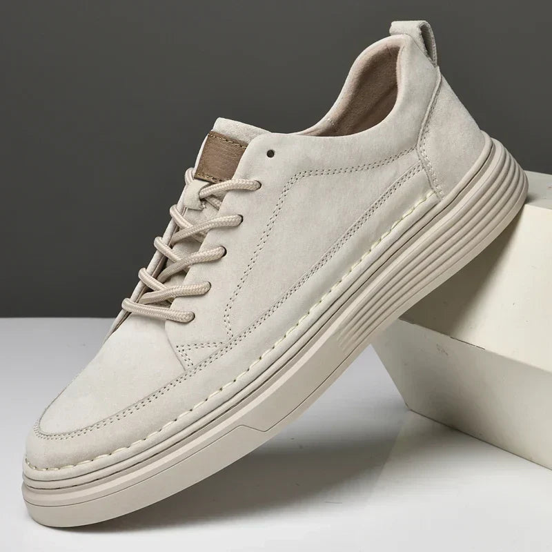 Angled shot of men's casual sneakers in khaki brown colorway