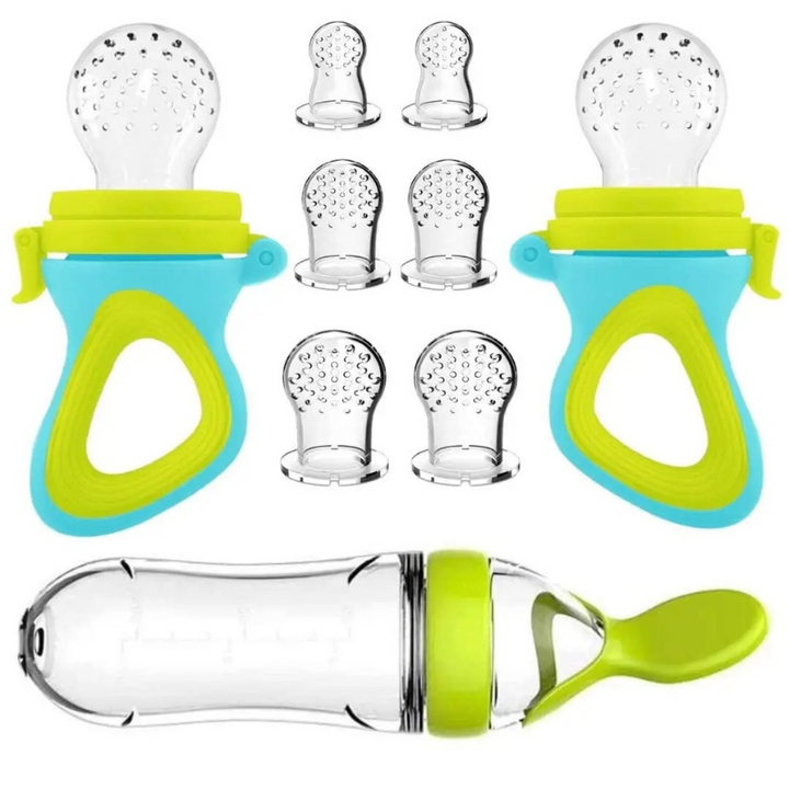 Three colorful baby fruit feeders in blue pink and green for tableware