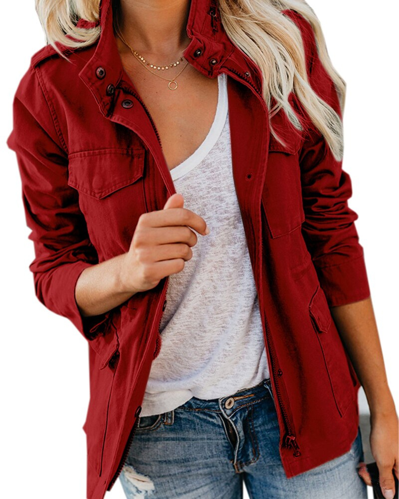 Close up of fabric and button details on stylish womens fall outerwear