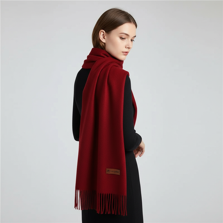 Soft oversized winter scarf draped elegantly over shoulders