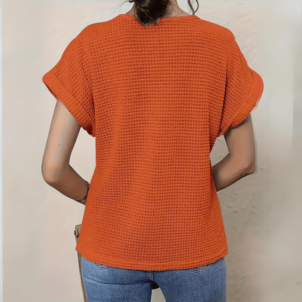 Flat lay of the elegant womens lace detail summer top