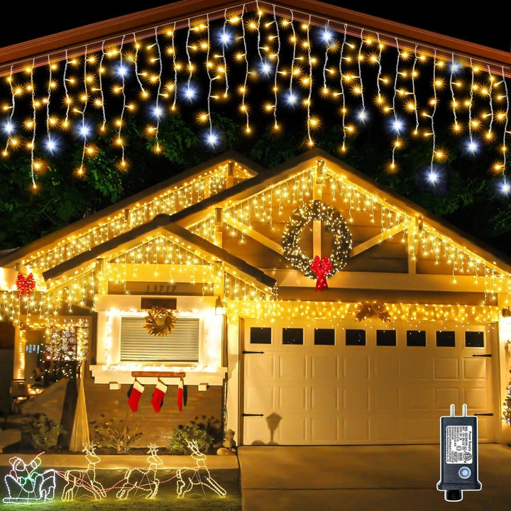 Outdoor holiday lighting featuring cascading warm white Christmas curtain lights