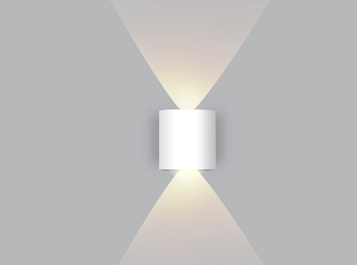 Energy efficient modern interior lighting fixture mounted in a stylish bedroom.