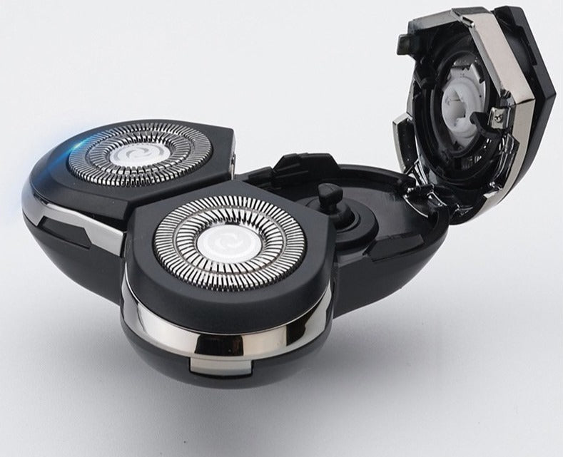 Close-up view of the open dual-ring shaving head mechanism