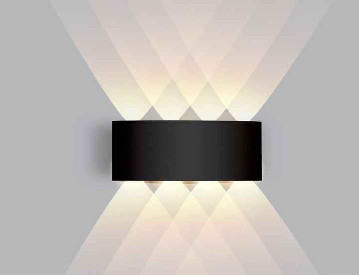 Sleek black finish modern LED wall lamp mounted on a neutral office wall.