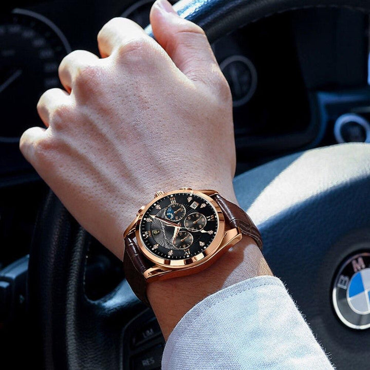 Lifestyle shot of a man wearing the stylish analog wristwatch while driving