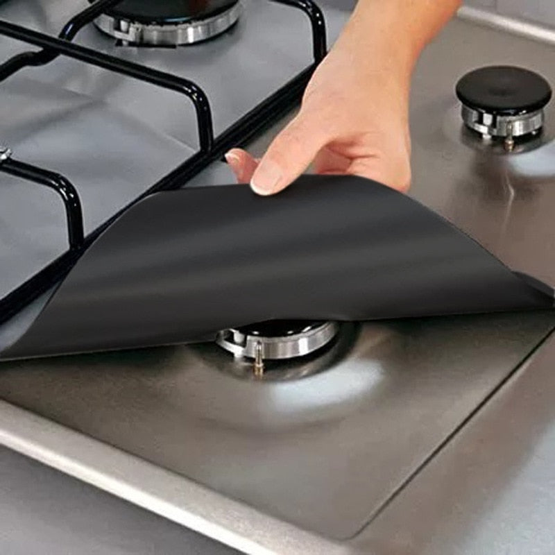 Durable kitchen cleaning accessory protecting stove surface from spills