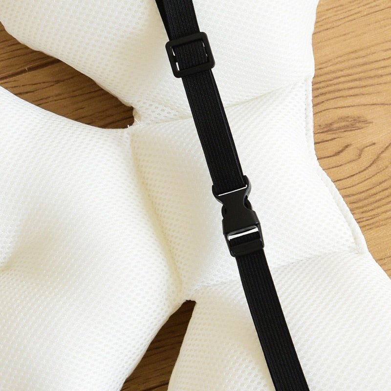 Soft baby seat liner for pram, showing secure harness slots and breathable fabric