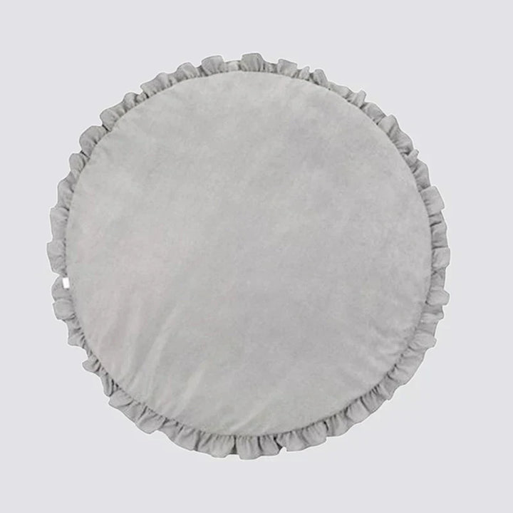 Folded gray baby crawling mat showing thick padding and texture