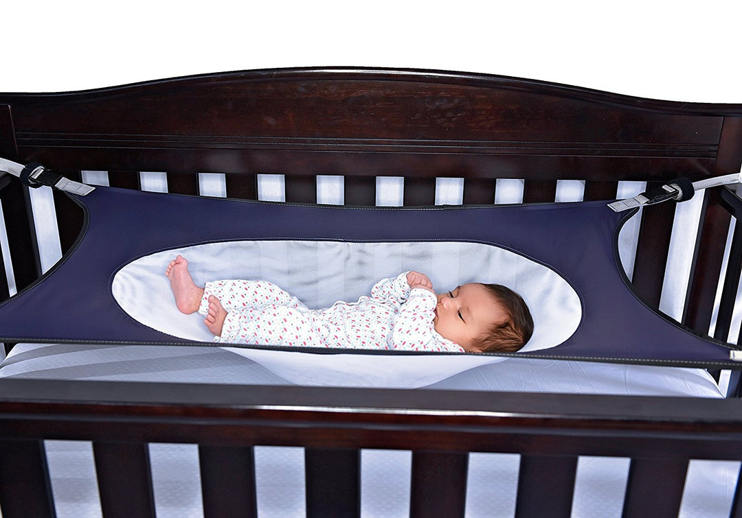 Baby hammock for cot and playpen in soothing blue, promoting better infant sleep