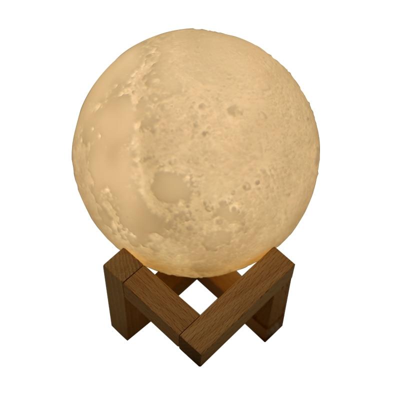 Realistic moon lamp design resting on a wooden stand