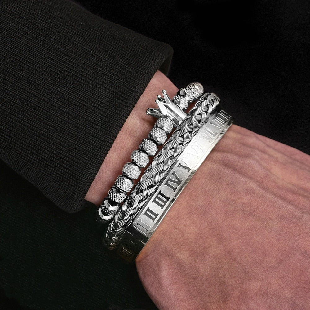 Close up of mens gold roman numeral bracelet with crystal accents