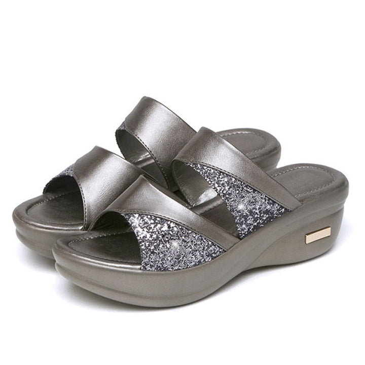 Pair of elegant women's wedge sandals designed for daily comfort