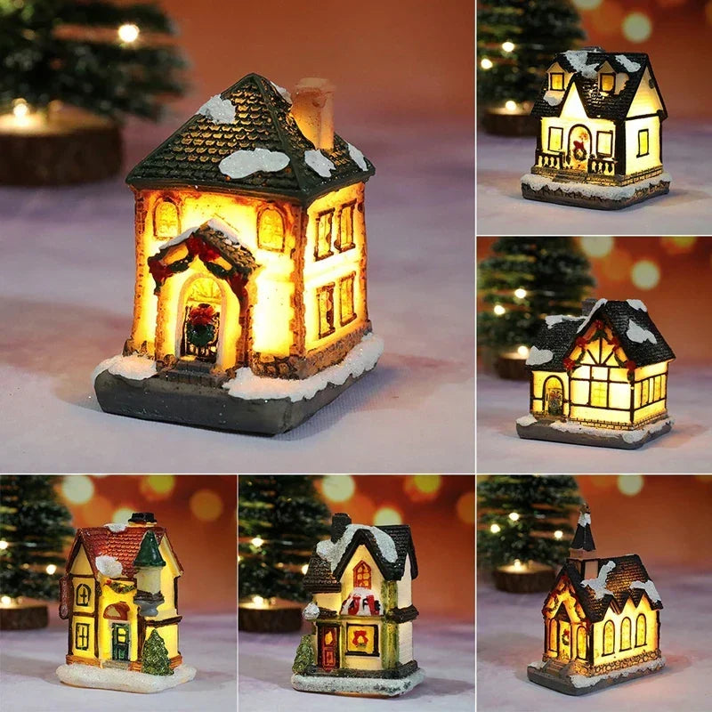 Enchanted Light-Up Christmas House glowing softly on a snowy display surface as a festive holiday decoration