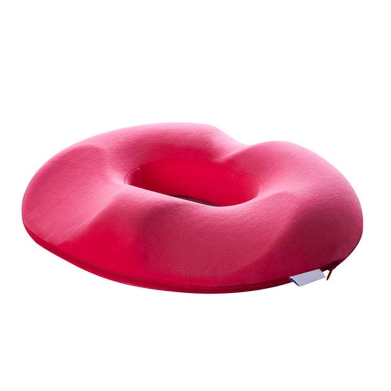 Orthopaedic donut seat cushion showing ergonomic curve for tailbone pain relief