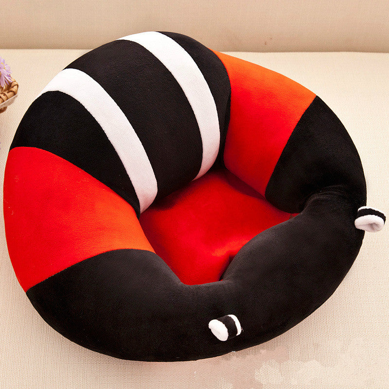 Close up of baby sitting chair fabric and secure harness restraint design