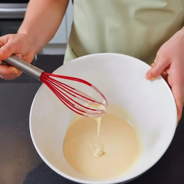Complete set of baking tools and kitchen accessories arranged neatly
