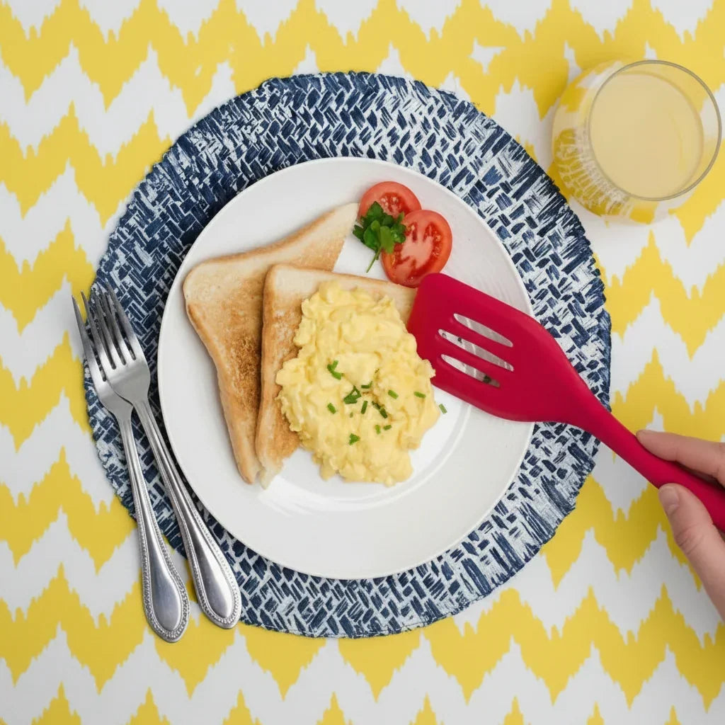 Heat resistant non-stick cooking tools made with flexible silicone and wood handles