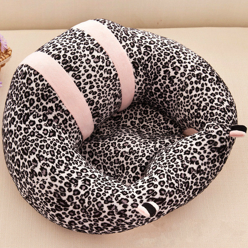 Baby support chair featuring attached toys for sensory play and motor skills