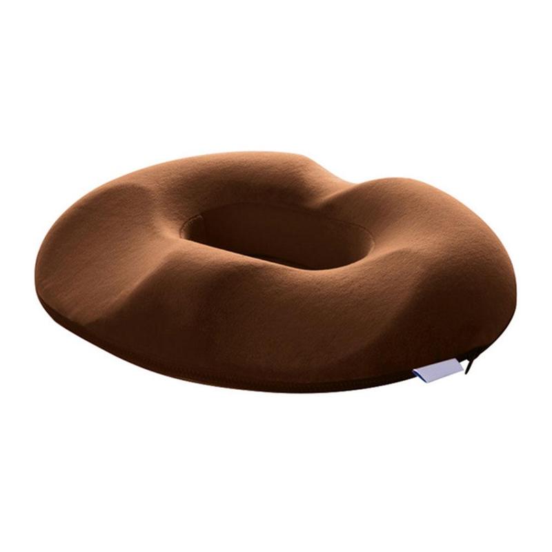 Ergonomic donut seat cushion placed on a modern office chair for daily use