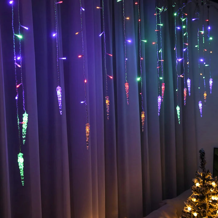 Multi-color festive LED light curtain glowing in a dark room