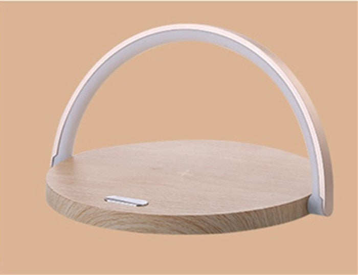Close-up of the Qi wireless charger pad on the versatile LED night lamp base